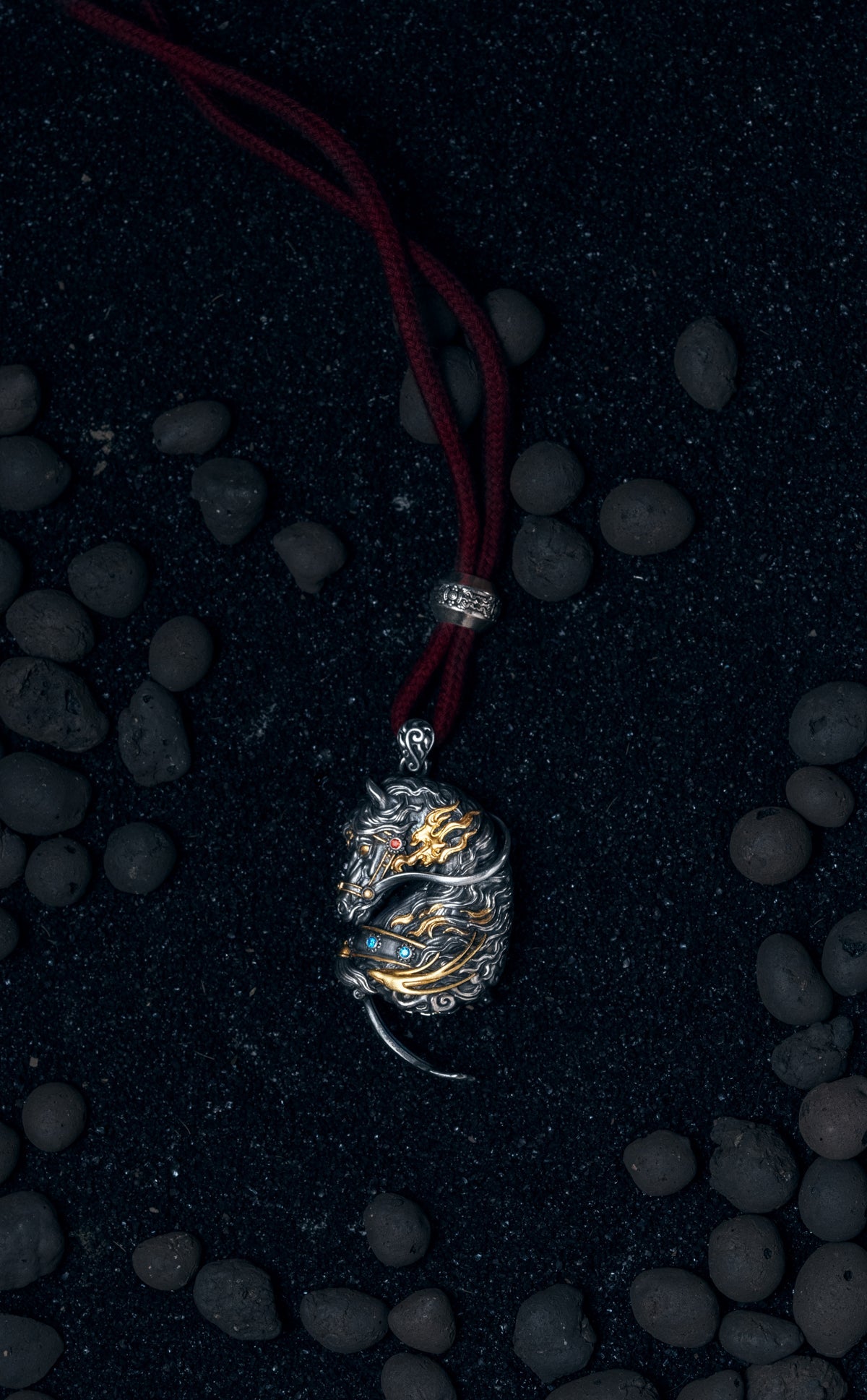 Wind horse gau locket pendant opened, showing the hinged sterling silver chamber inside