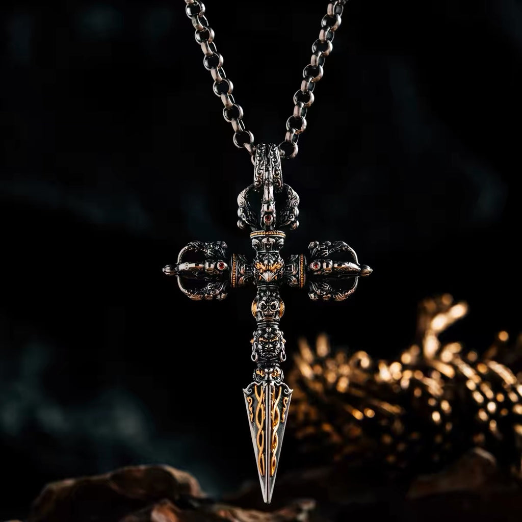 24K fire-gilded phurba pendant hanging on a silver chain, crossed vajra crown set with natural garnets