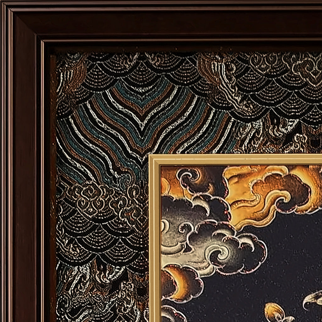 Akashagarbha thangka detail: corner of the black and silver silk brocade frame-within-a-frame