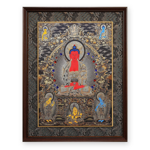 Amitabha Buddha thangka with Shakyamuni, Tsongkhapa and the Medicine Buddha above, two Naginis and Yellow Jambhala below, framed in Ink & Gold silk brocade, on a white background