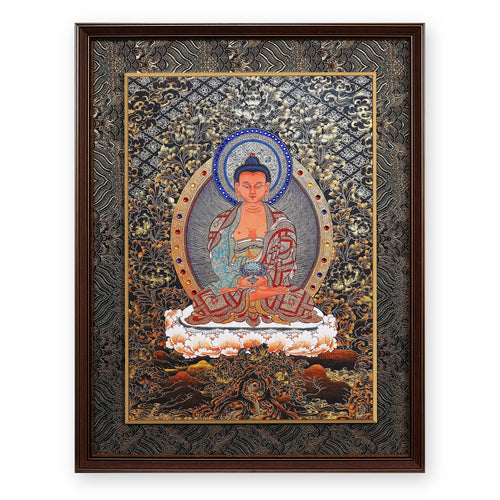 Amitabha Buddha black and gold thangka with blue crystal halo, framed in Ink & Gold silk brocade, on a white background