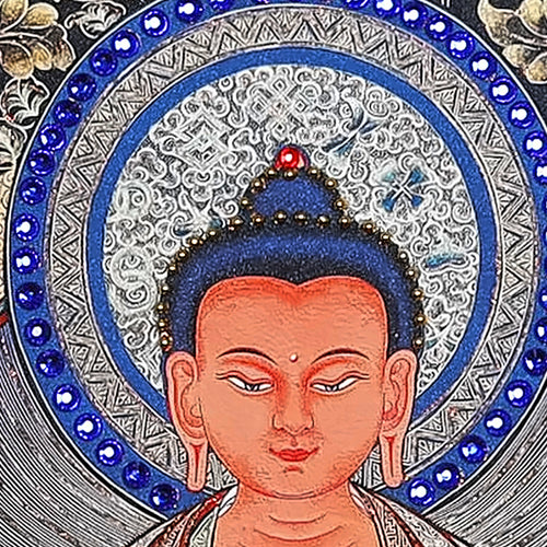 Amitabha thangka detail: face within a halo of blue glass crystals set by hand