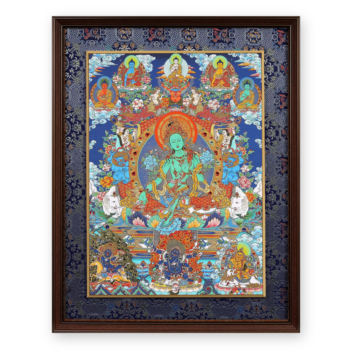 Green Tara thangka with the Five Buddhas above and three protectors below, framed in Night Sky silk brocade, on a white background