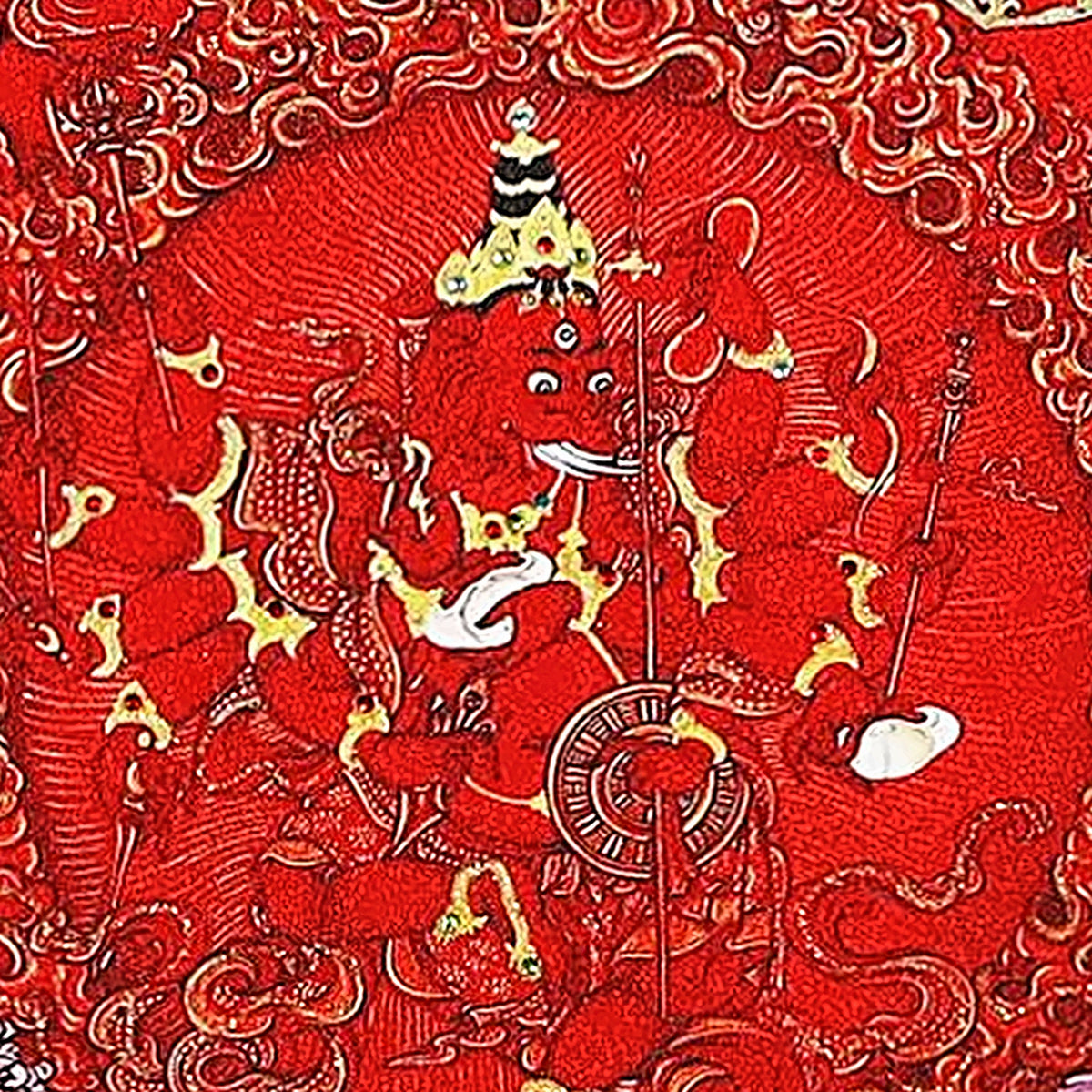Kurukulla thangka detail: one of the two smaller red figures below