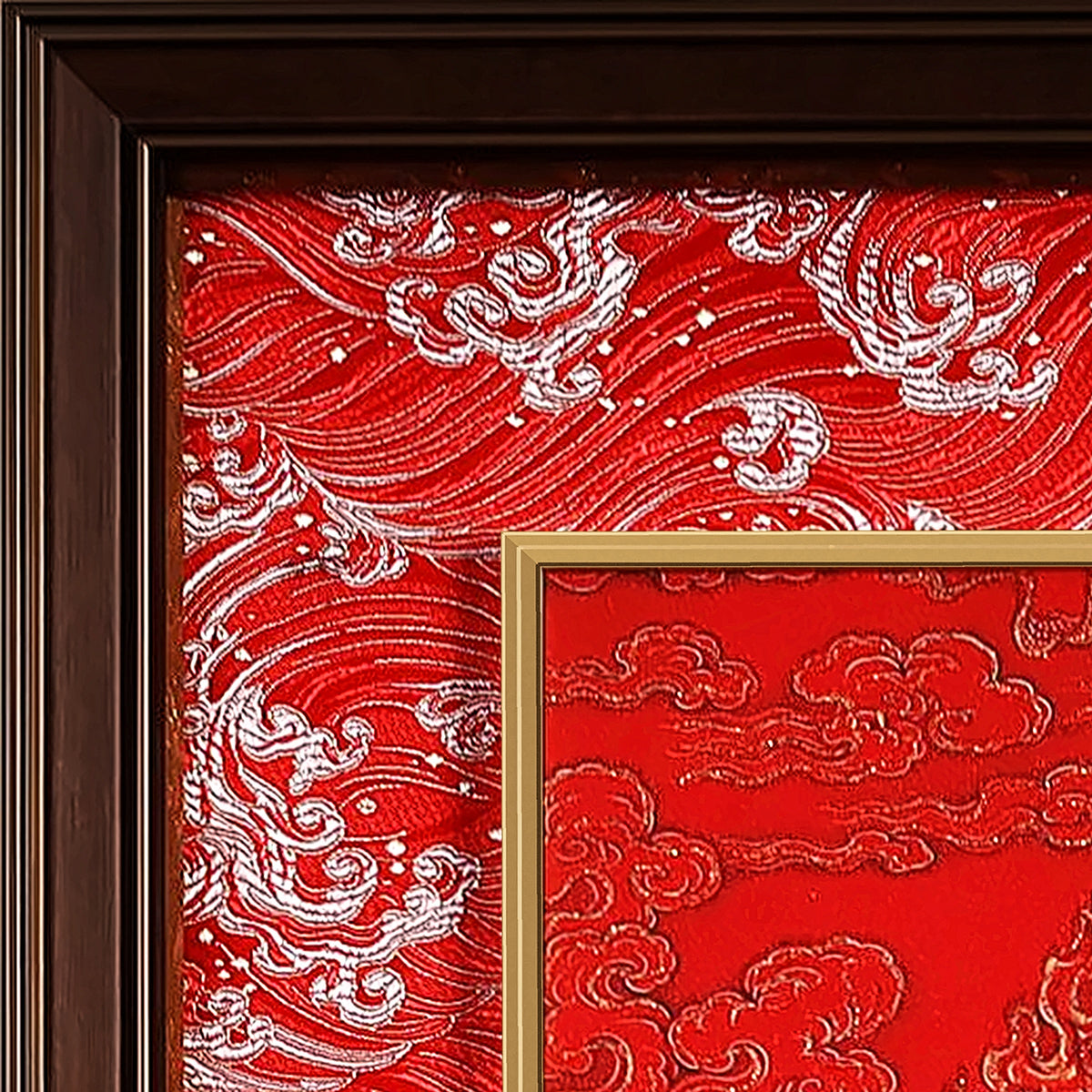 Kurukulla thangka detail: corner of the red silk brocade frame-within-a-frame