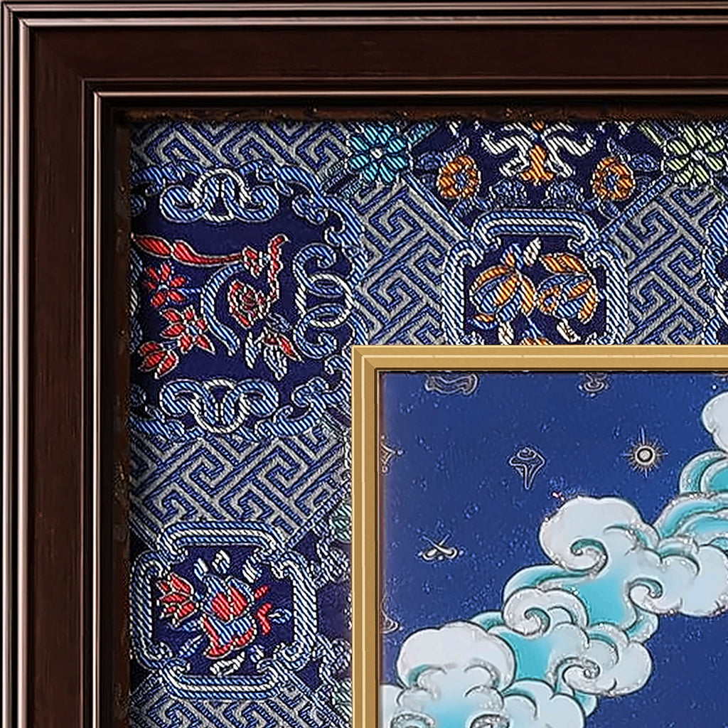 Manjushri thangka detail: corner of the blue silk brocade frame-within-a-frame