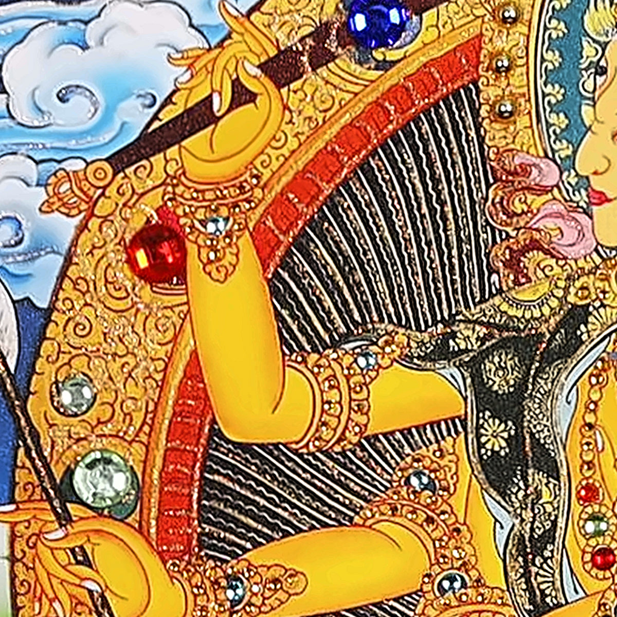 Marici thangka detail: arms holding bow and arrow against the golden wheel