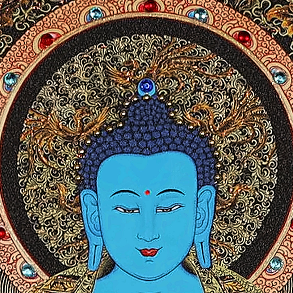 Medicine Buddha thangka detail: blue face and dark blue hair inside a halo set with crystals