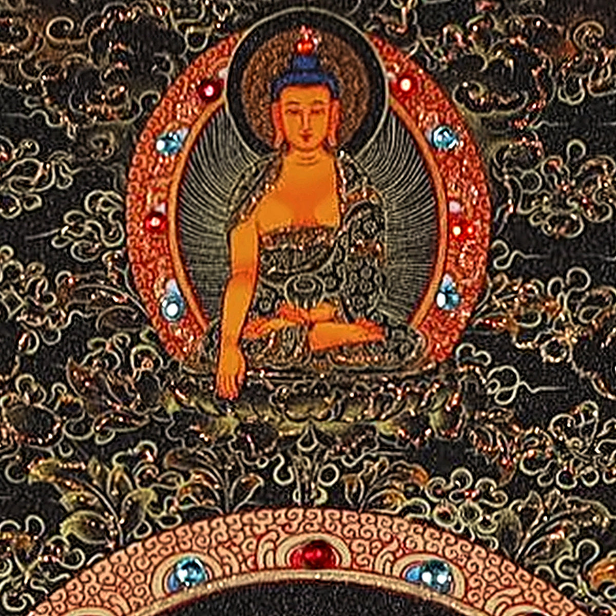 Medicine Buddha thangka detail: one of the three Buddhas at the top, in a halo set with red and blue crystals