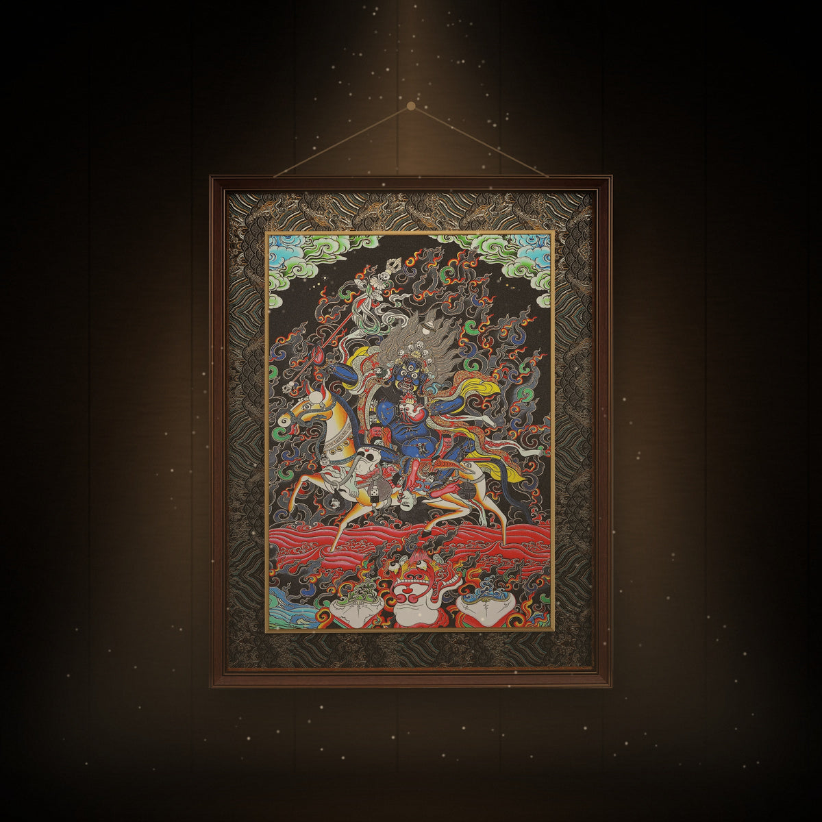 Palden Lhamo thangka hanging in a room under warm light