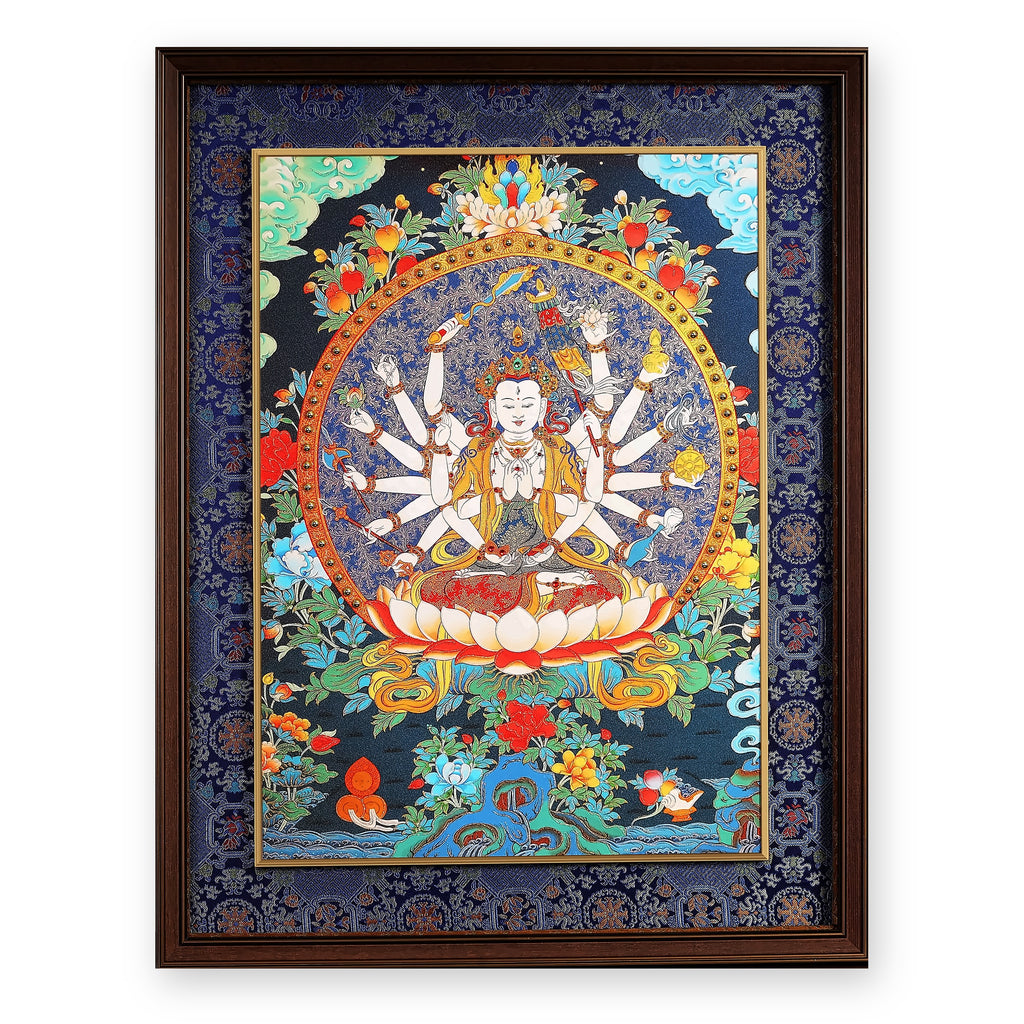 Cundi (Zhunti) thangka, white and eighteen-armed on a lotus, framed in Night Sky silk brocade, on a white background