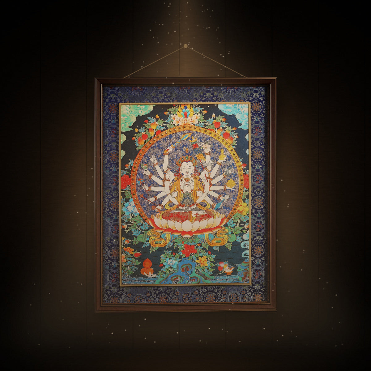 Cundi thangka hanging in a room under warm light