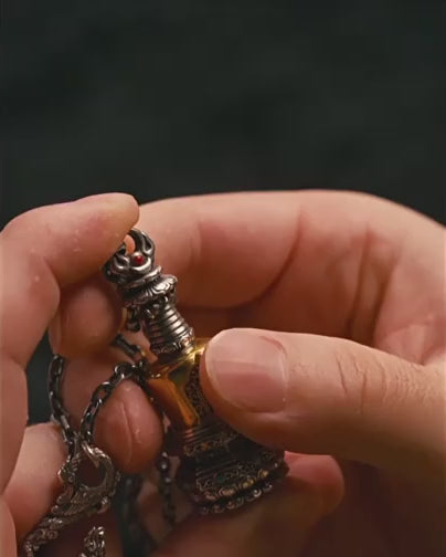 Tibetan stupa locket video – the lotus base unscrewed to show the hollow relic chamber inside