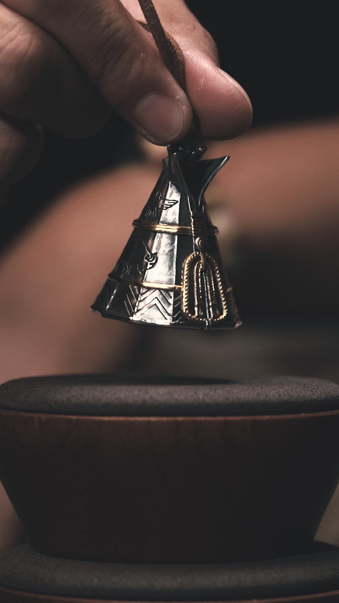 Forest Lodge bell pendant video – hand-carved sterling silver lodge with a small bell hung inside