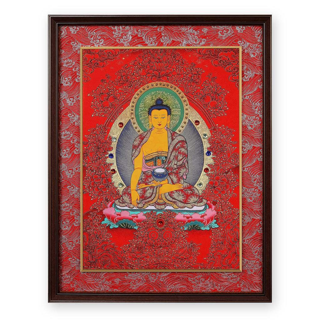 Shakyamuni Buddha thangka on a red ground, framed in Crimson Cloud silk brocade, on a white background
