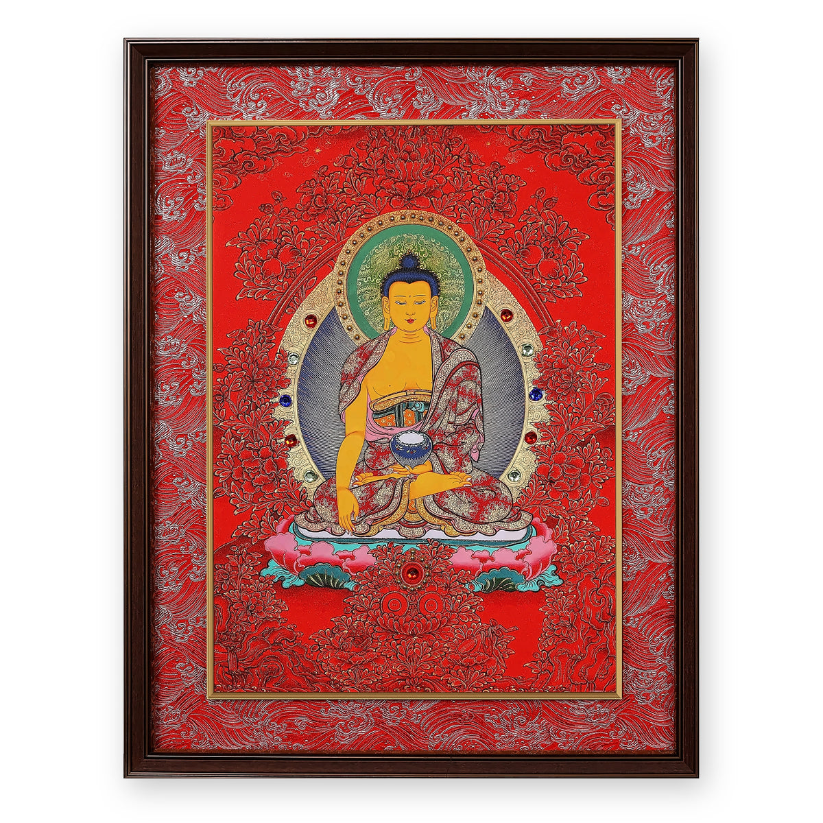 Shakyamuni Buddha thangka on a red ground, framed in Crimson Cloud silk brocade, on a white background