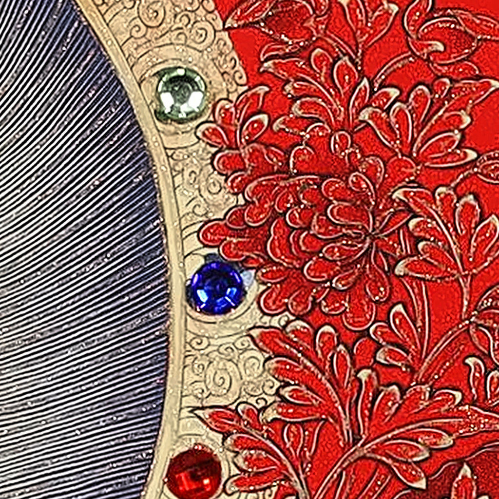 Shakyamuni thangka detail: red, blue and clear glass crystals set by hand along the mandorla