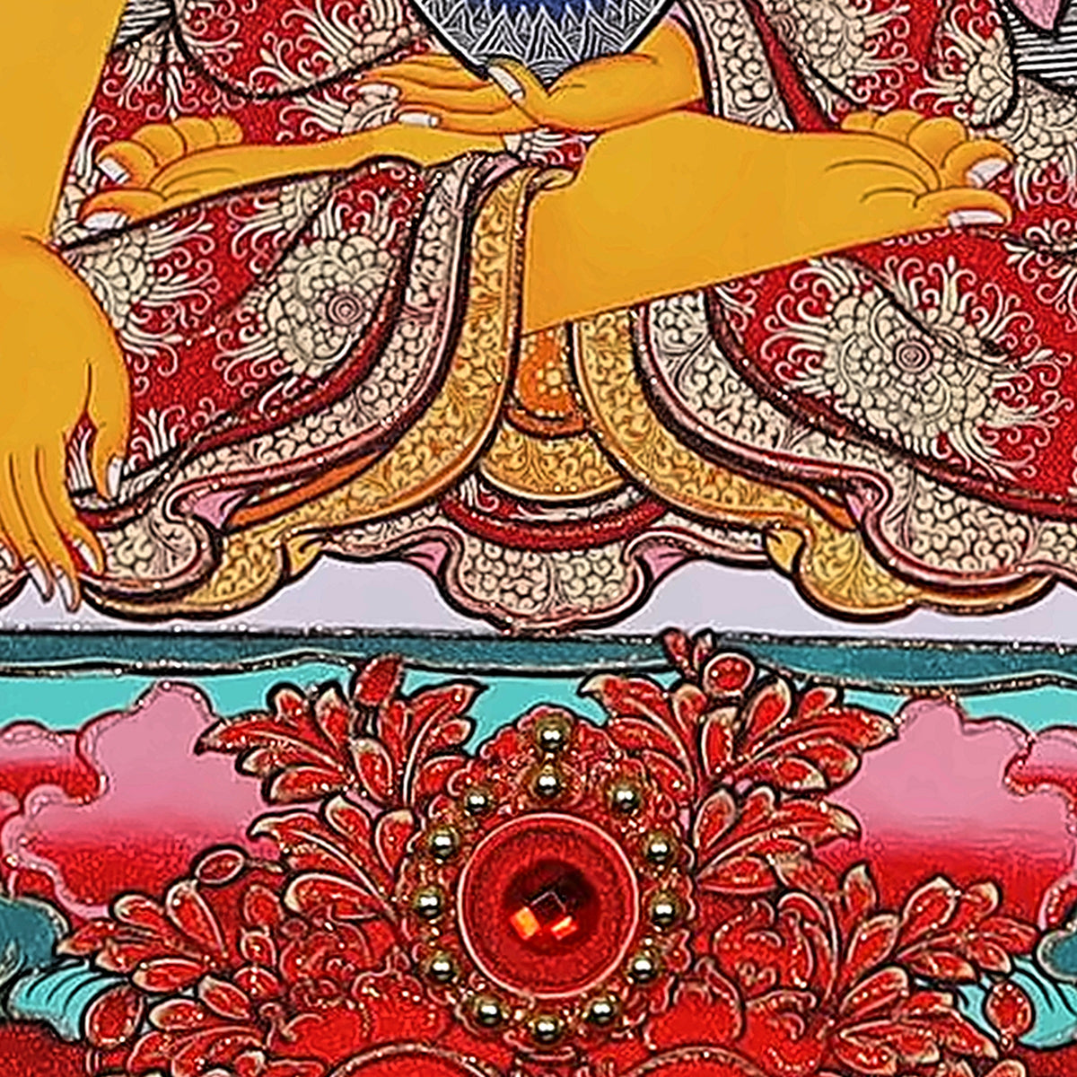 Shakyamuni thangka detail: lotus seat and red crystal ringed in gold beads