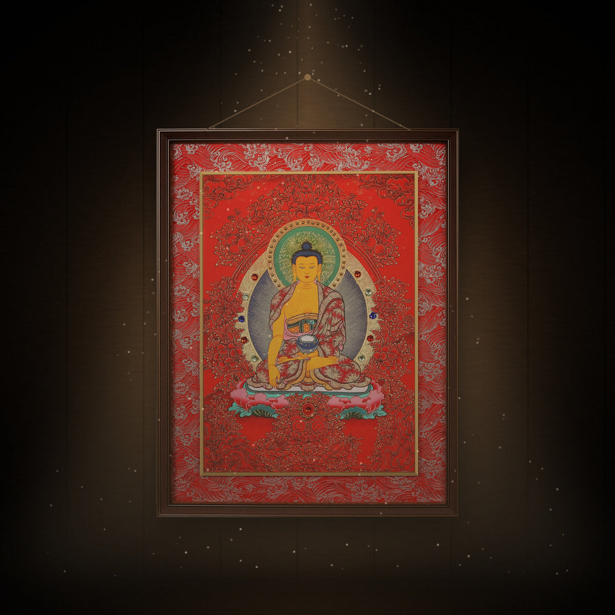 Shakyamuni Buddha thangka hanging in a room under warm light