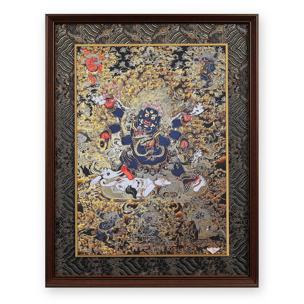 Six-Armed Mahakala black and gold thangka, framed in Ink & Gold silk brocade, on a white background