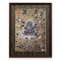Six-Armed Mahakala black and gold thangka, framed in Ink & Gold silk brocade, on a white background