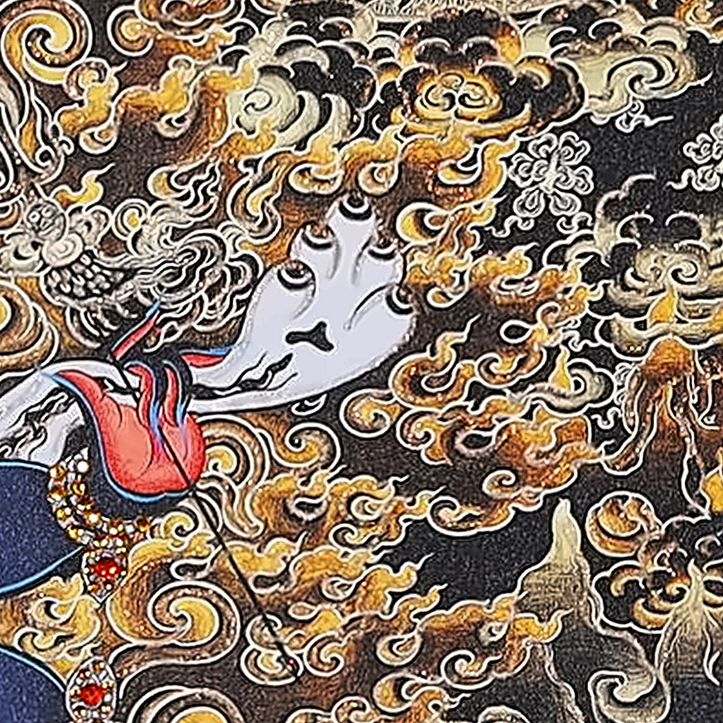 Six-Armed Mahakala thangka detail: hand at his heart holding a skull cup