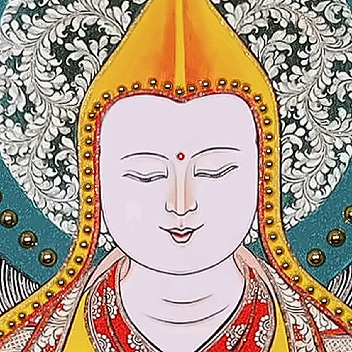 Tsongkhapa thangka detail: face and yellow pointed pandita hat edged with gold beads
