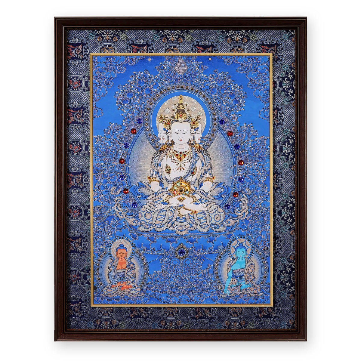 Four-faced Vairocana Buddha thangka on a blue ground, framed in Night Sky silk brocade, on a white background