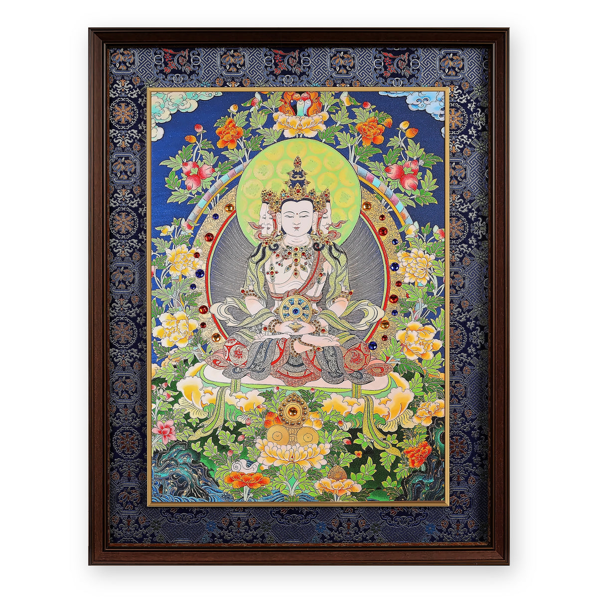 Four-faced Vairocana Buddha thangka with peonies and a rainbow, framed in Night Sky silk brocade, on a white background