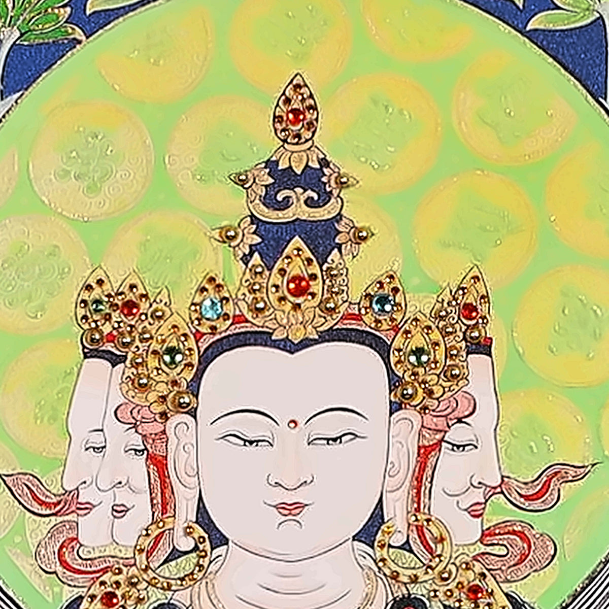 Vairocana thangka detail: white faces under a crown set with crystals