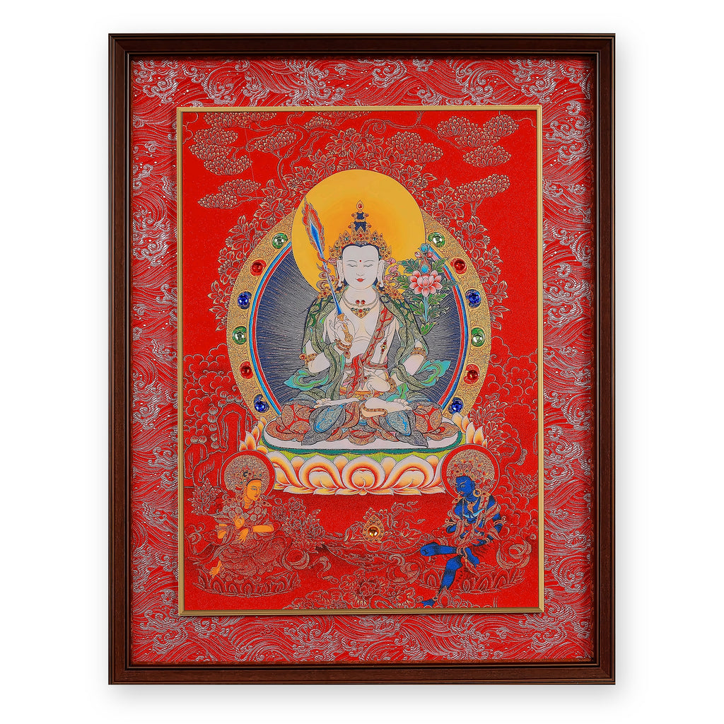 White Manjushri thangka with flaming sword on a red ground, framed in Crimson Cloud silk brocade, on a white background