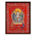 White Manjushri thangka with flaming sword on a red ground, framed in Crimson Cloud silk brocade, on a white background