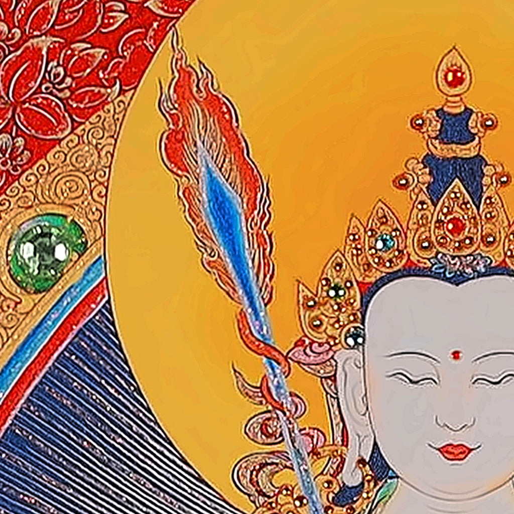 White Manjushri thangka detail: flaming sword at his shoulder