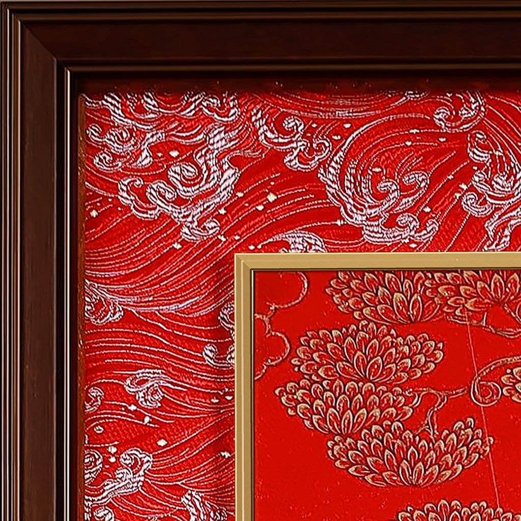 White Manjushri thangka detail: corner of the red silk brocade frame-within-a-frame