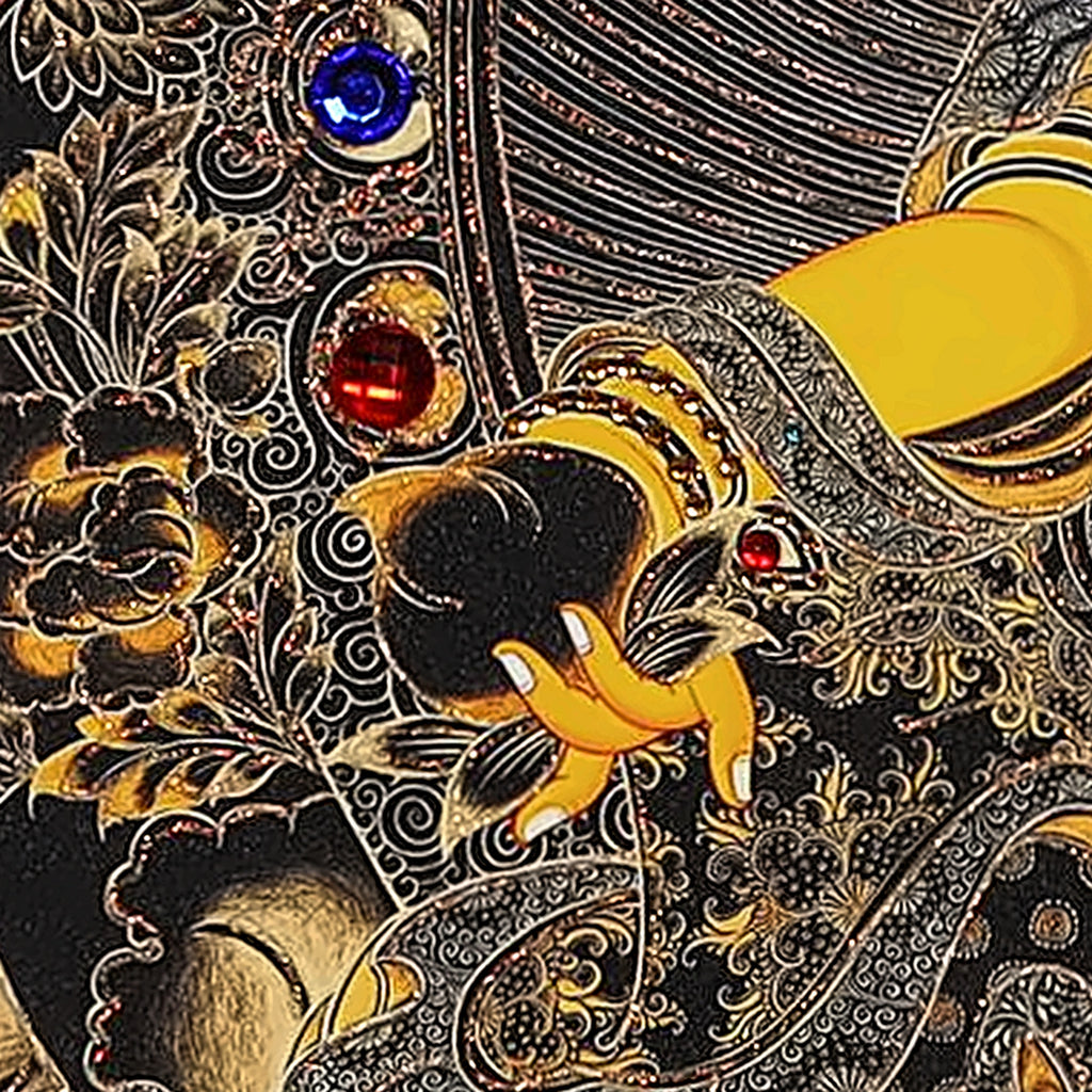 Yellow Jambhala thangka detail: right hand holding out a citron fruit, red and blue crystals on the mandorla